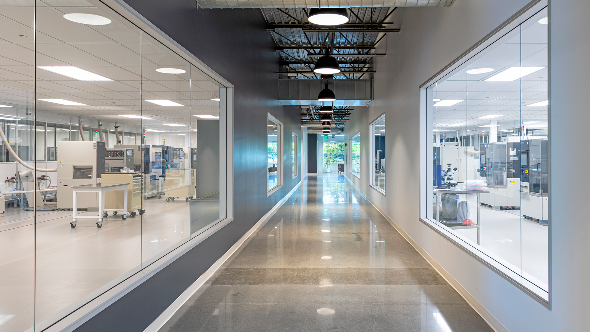 Interior at confidential client advanced technology facility laboratory corridor transparency