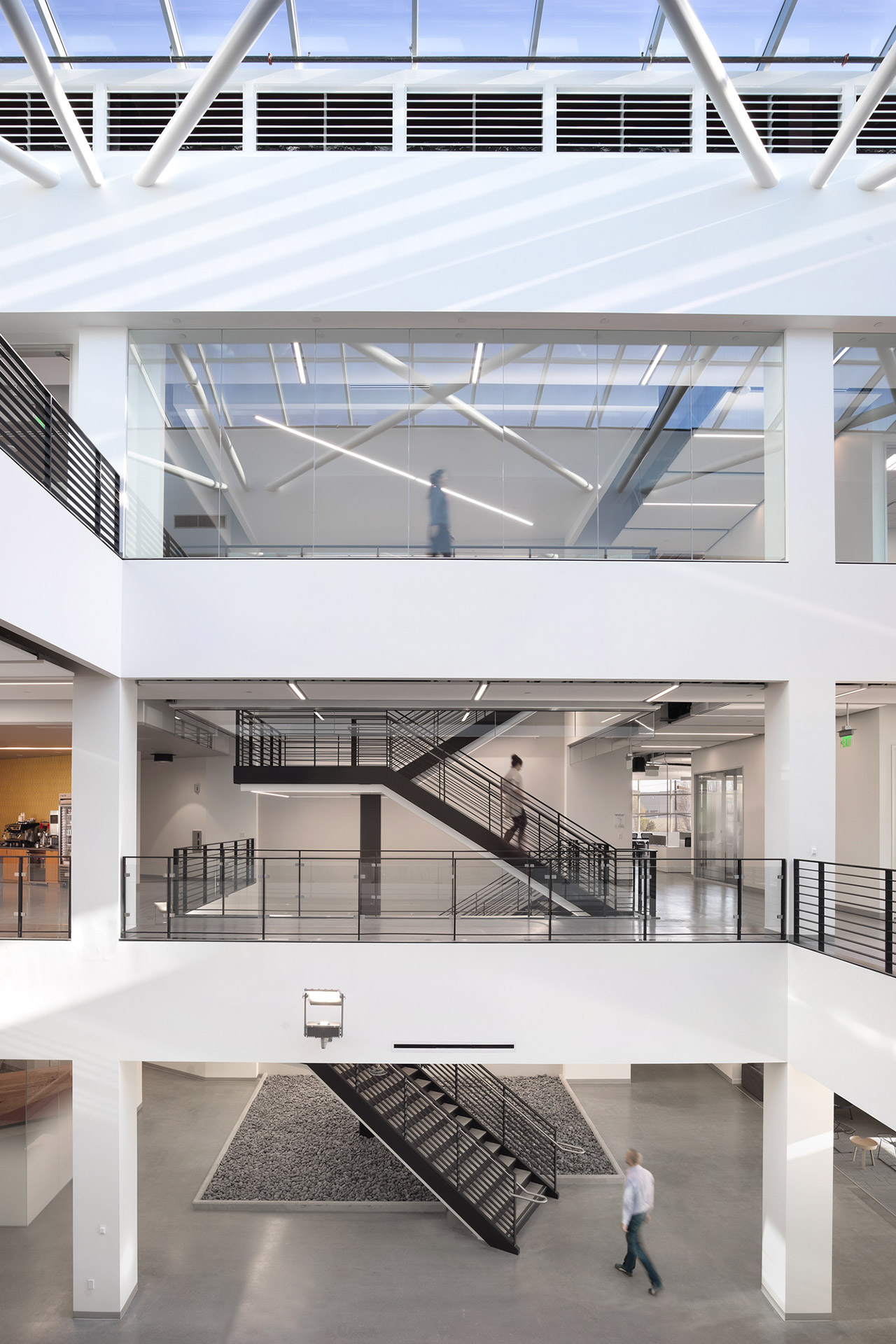 Interior at confidential client, life sciences, central stair, three levels, daylight