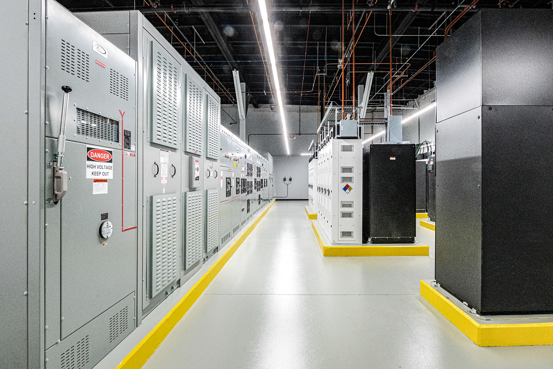 Interior at confidential client data center facility server room, electrical room, electrical panels