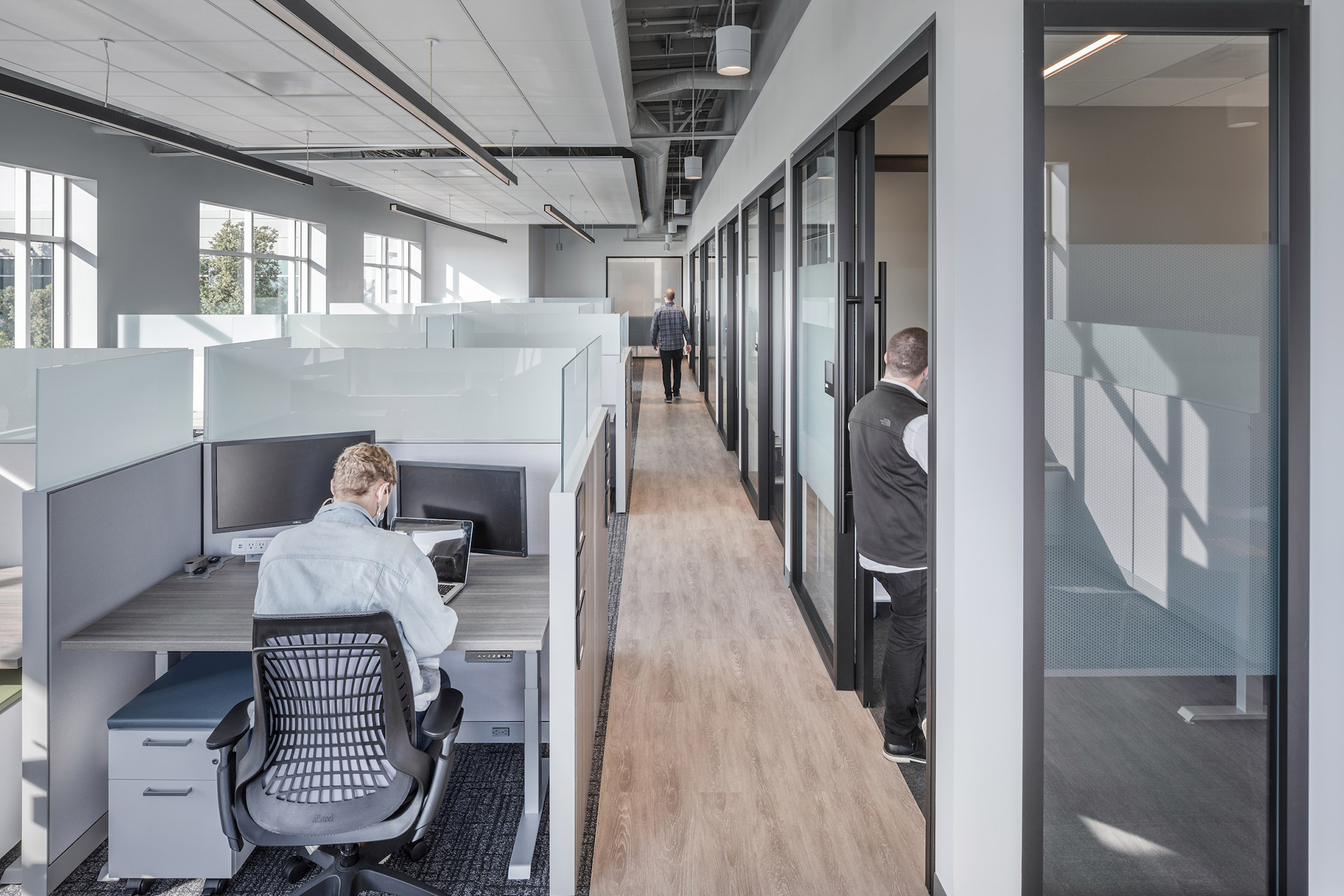 Interior at Exelixis 1701 HBP life science facility open and private offices with people working