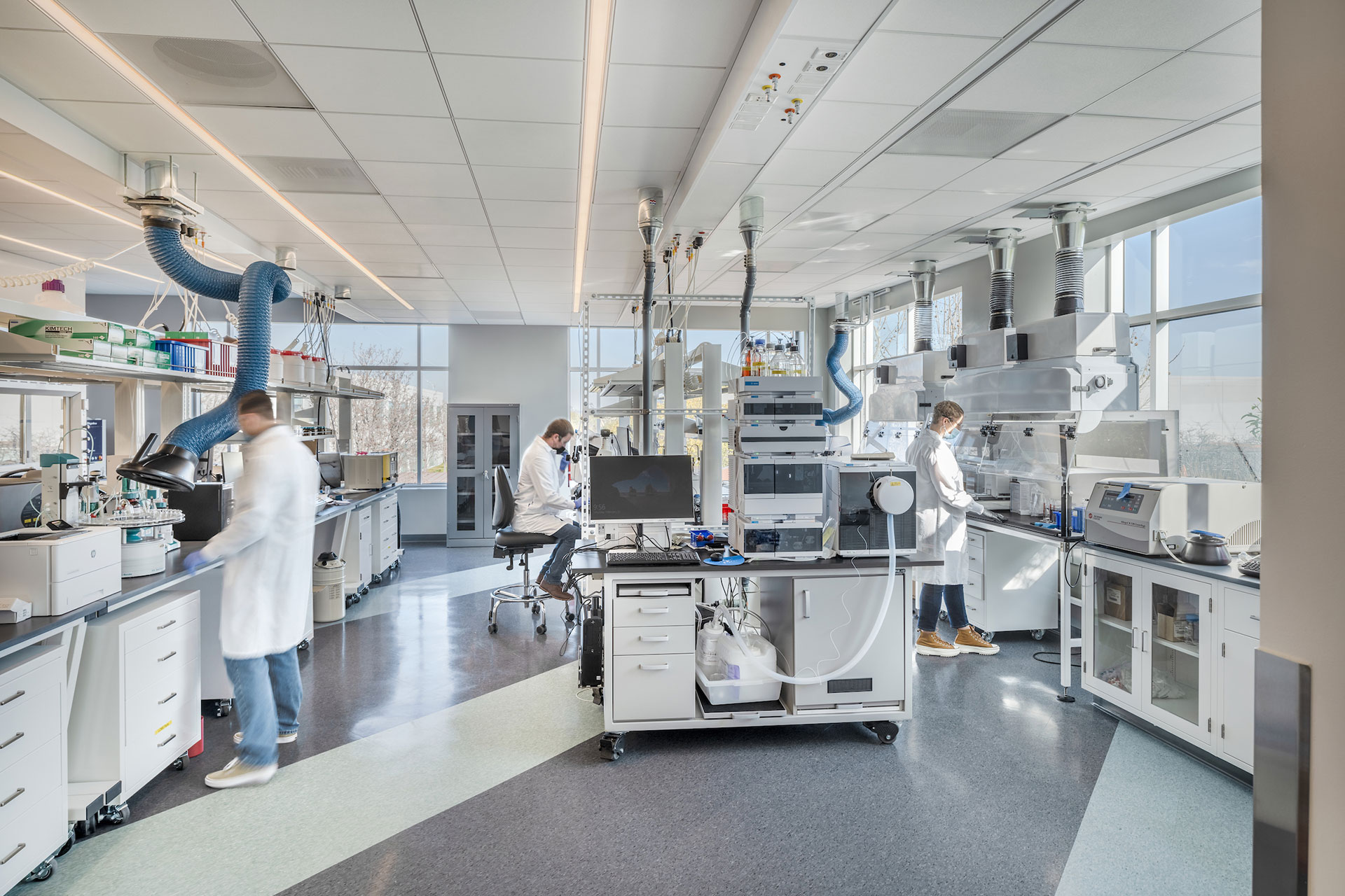 Interior at Exelixis 1701 HBP life science facility inside lab with people working