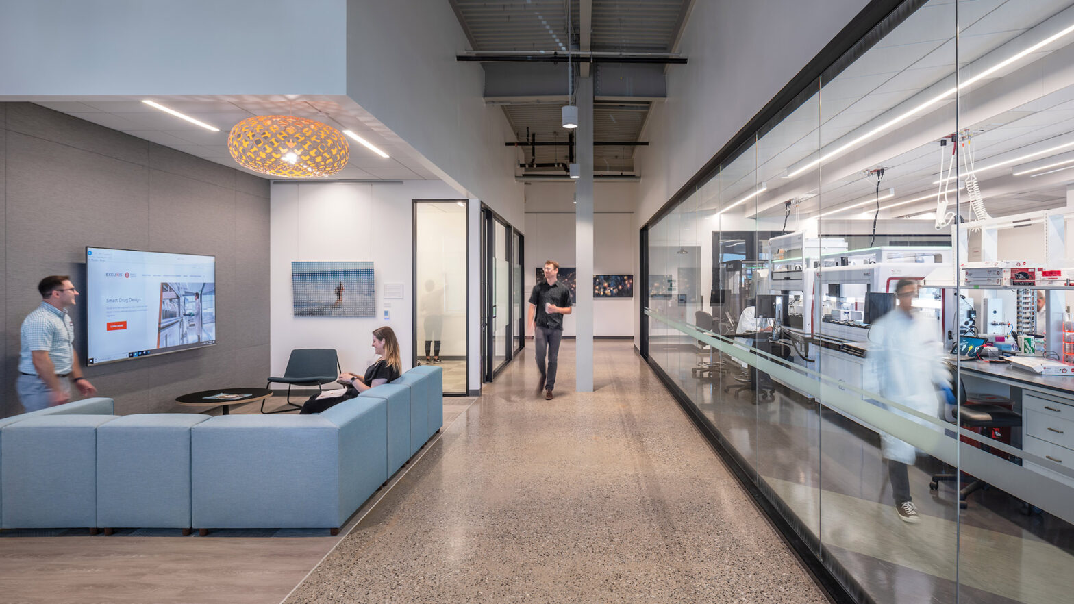 Interior at Exelixis 1851 and 1801 HBP life science facility inside lounge area with science on display view into lab