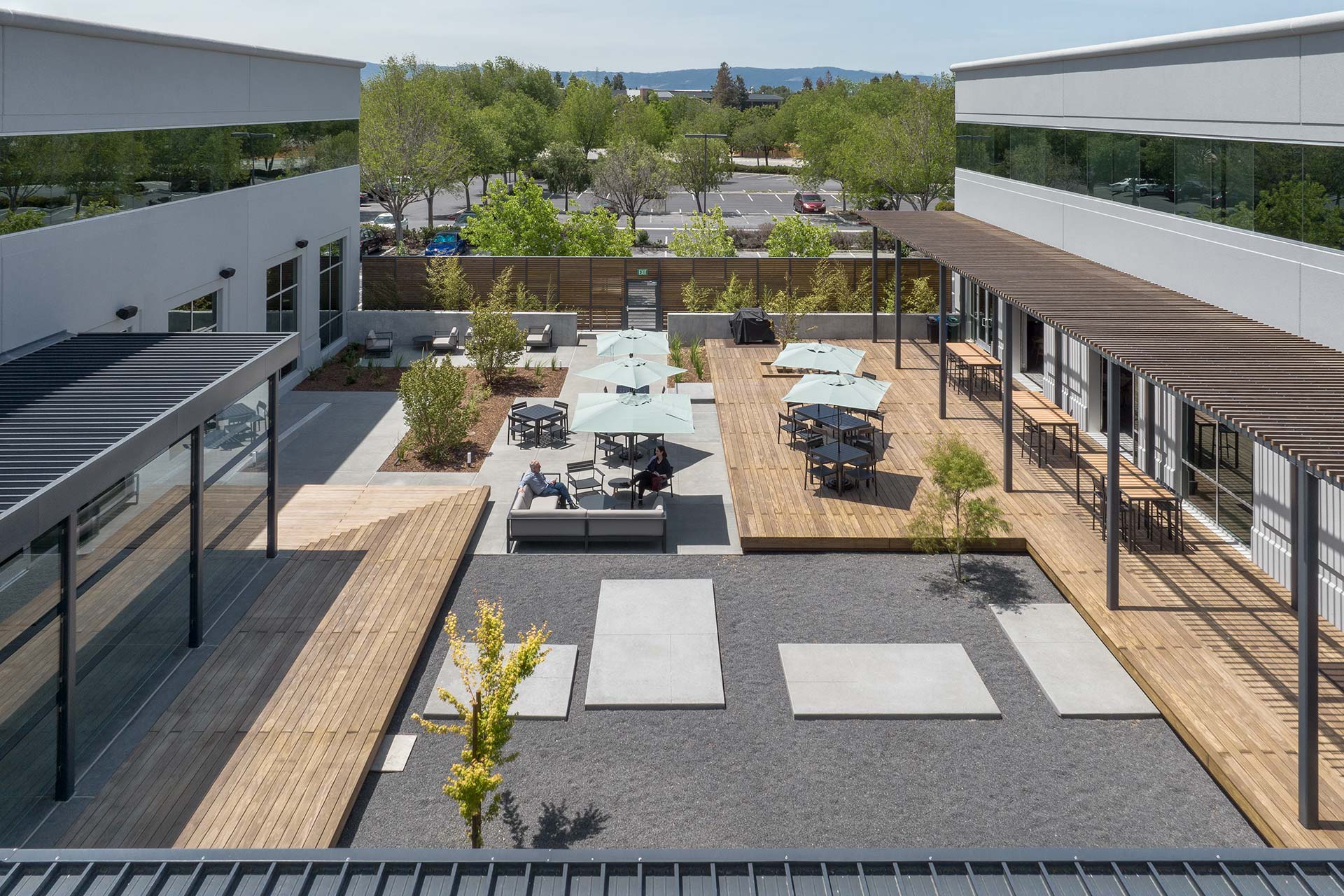 Exterior at Takara Bio life science facility, enclosed courtyard outdoor amenity space between buildings