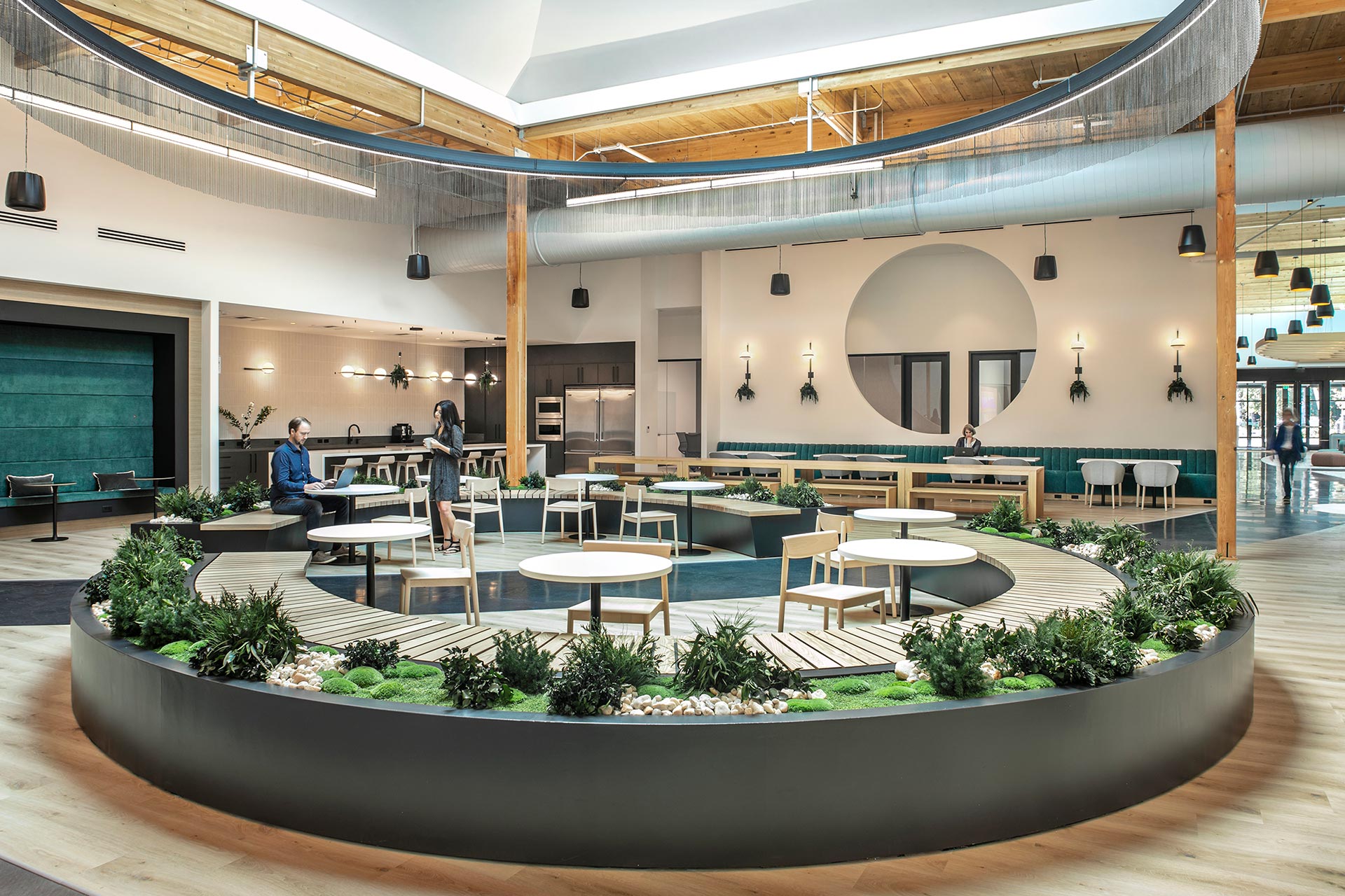 Interior at Twist Bioscience breakroom, eatery, kitchen, with skylight, circular central seating/biophilia feature