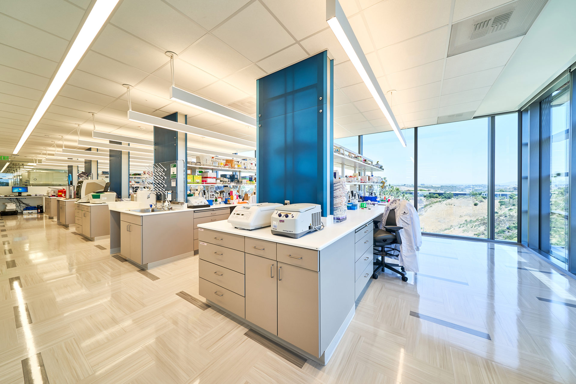Interior at Vertex Pharmaceuticals life science facility, lab with equipment