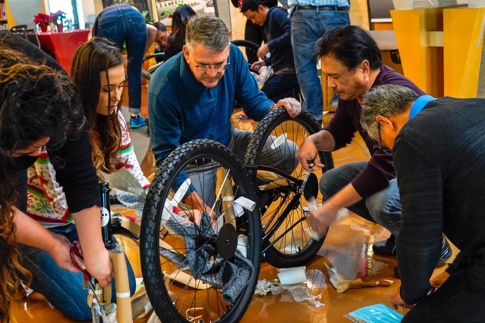DGA group building a bike for a charity event